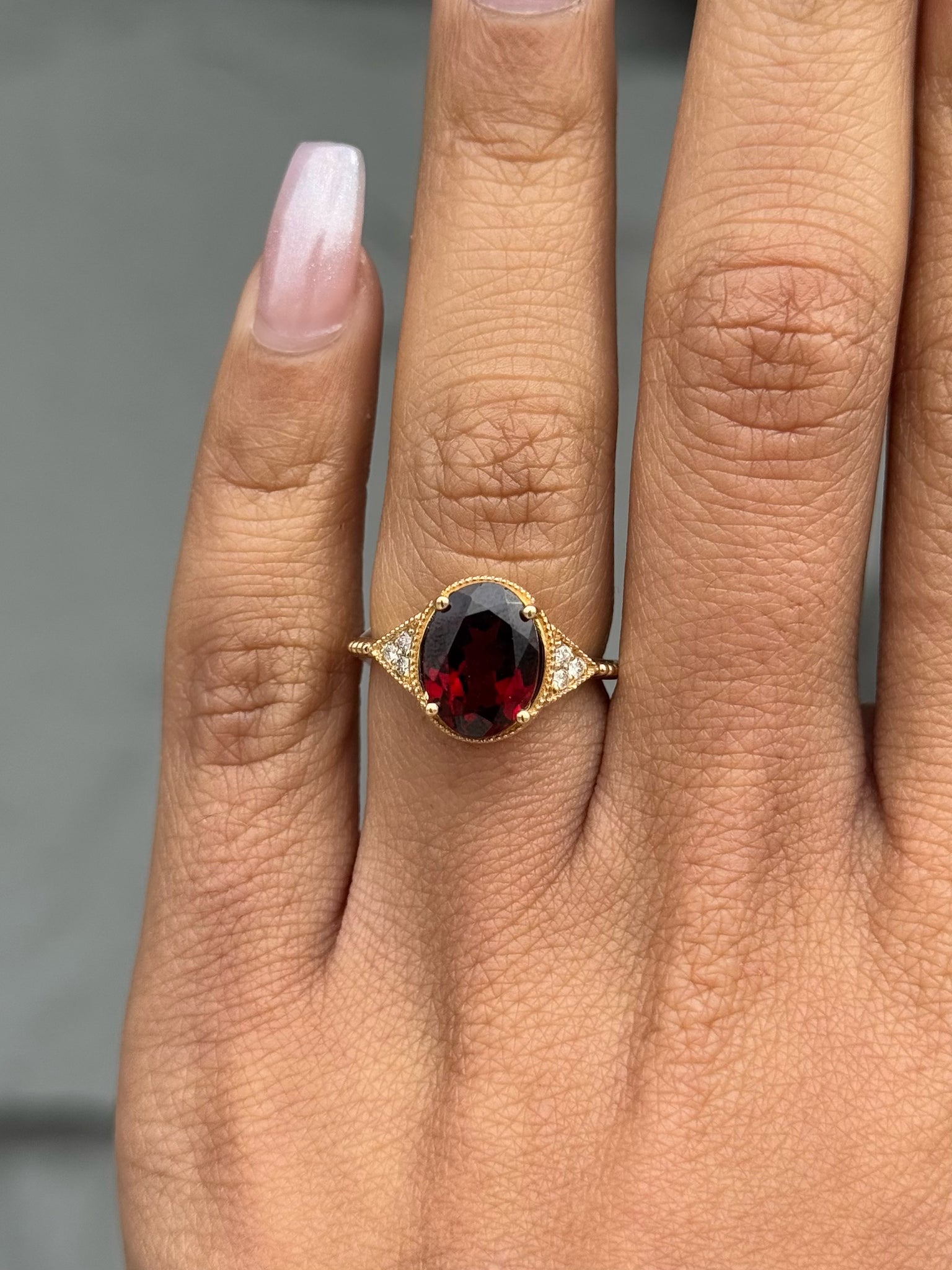 Oval Garnet Ring with Diamond Side Stones - Main Image